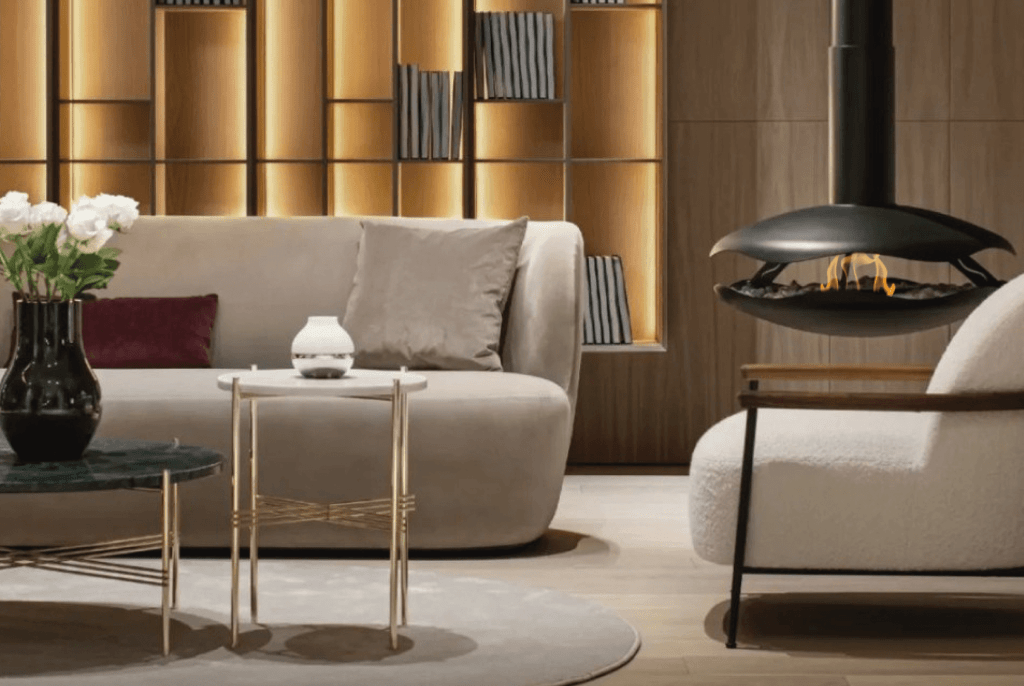 Perola suspended bioethanol fireplace in a luxurious and elegant living room with modern interior design.