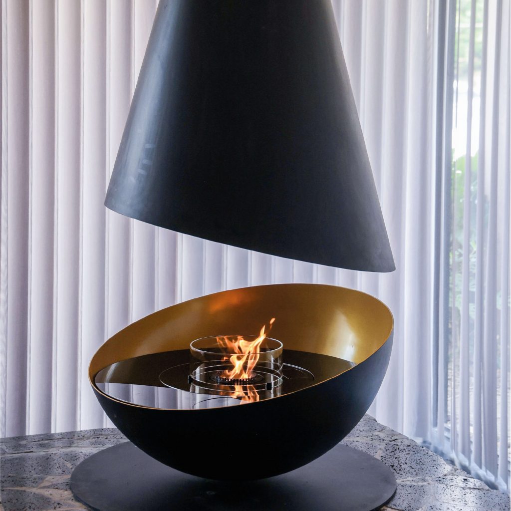 Thales, full view of suspended bioethanol fireplace in studio setting