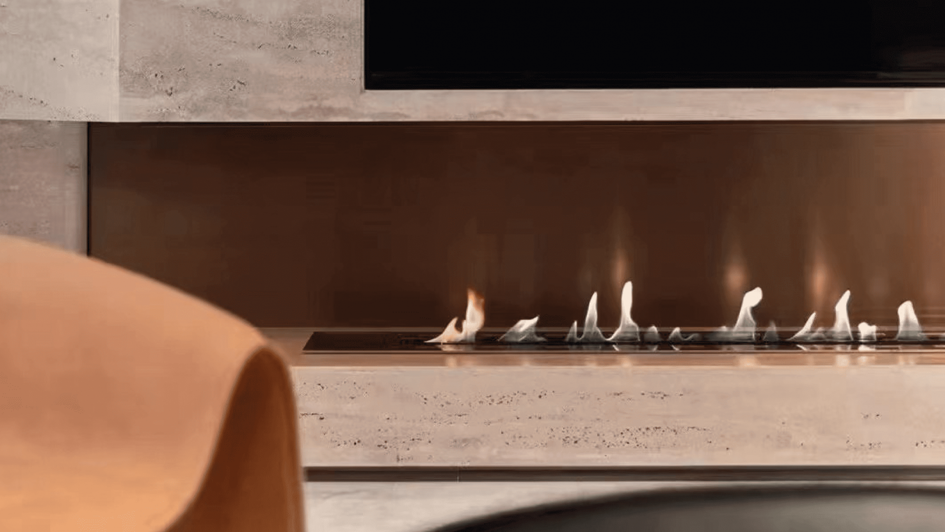 Fire Line bioethanol burner by GlammFire integrated into a modern fireplace design